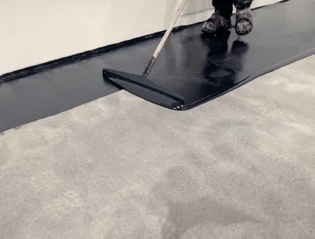 Commercial epoxy coating applied to a smooth concrete floor in Edmonton