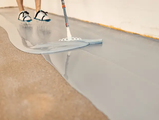 Garage epoxy floor coating with a clean, finished concrete surface in Edmonton