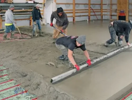 Basement concrete slab being poured and finished for an Edmonton home