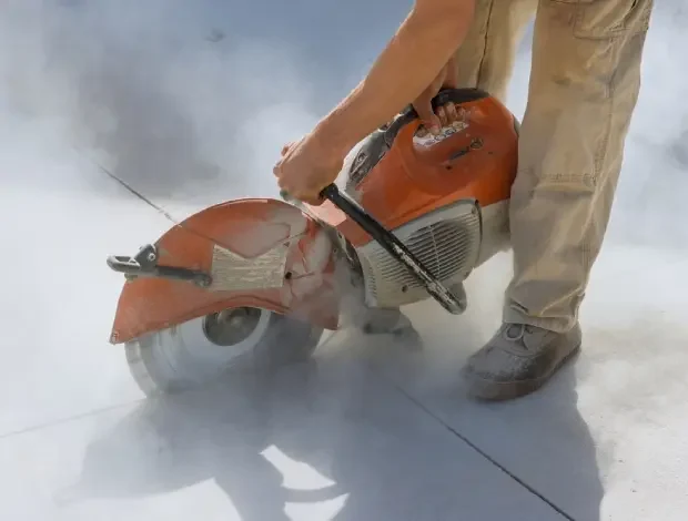 Concrete saw cutting on a slab or wall at an Edmonton project site