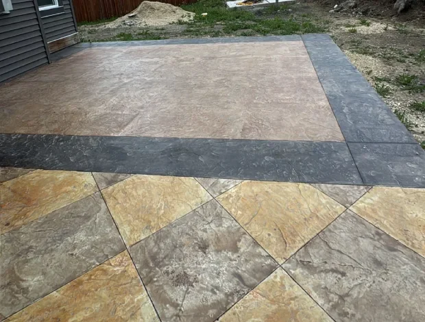 Concrete patio installation with formed edges and a clean finished surface