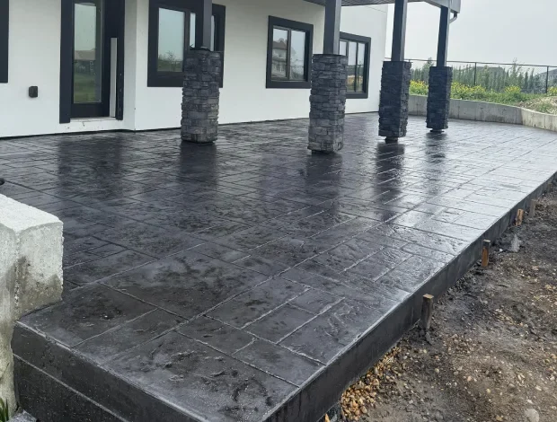 Stamped concrete patio with decorative pattern and rich surface detail